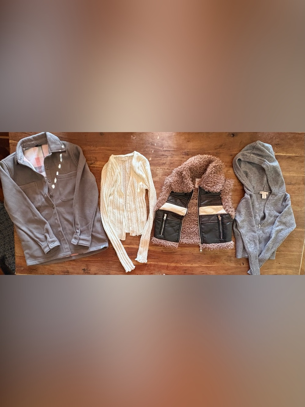 Bundle of 4 children’s sweaters.